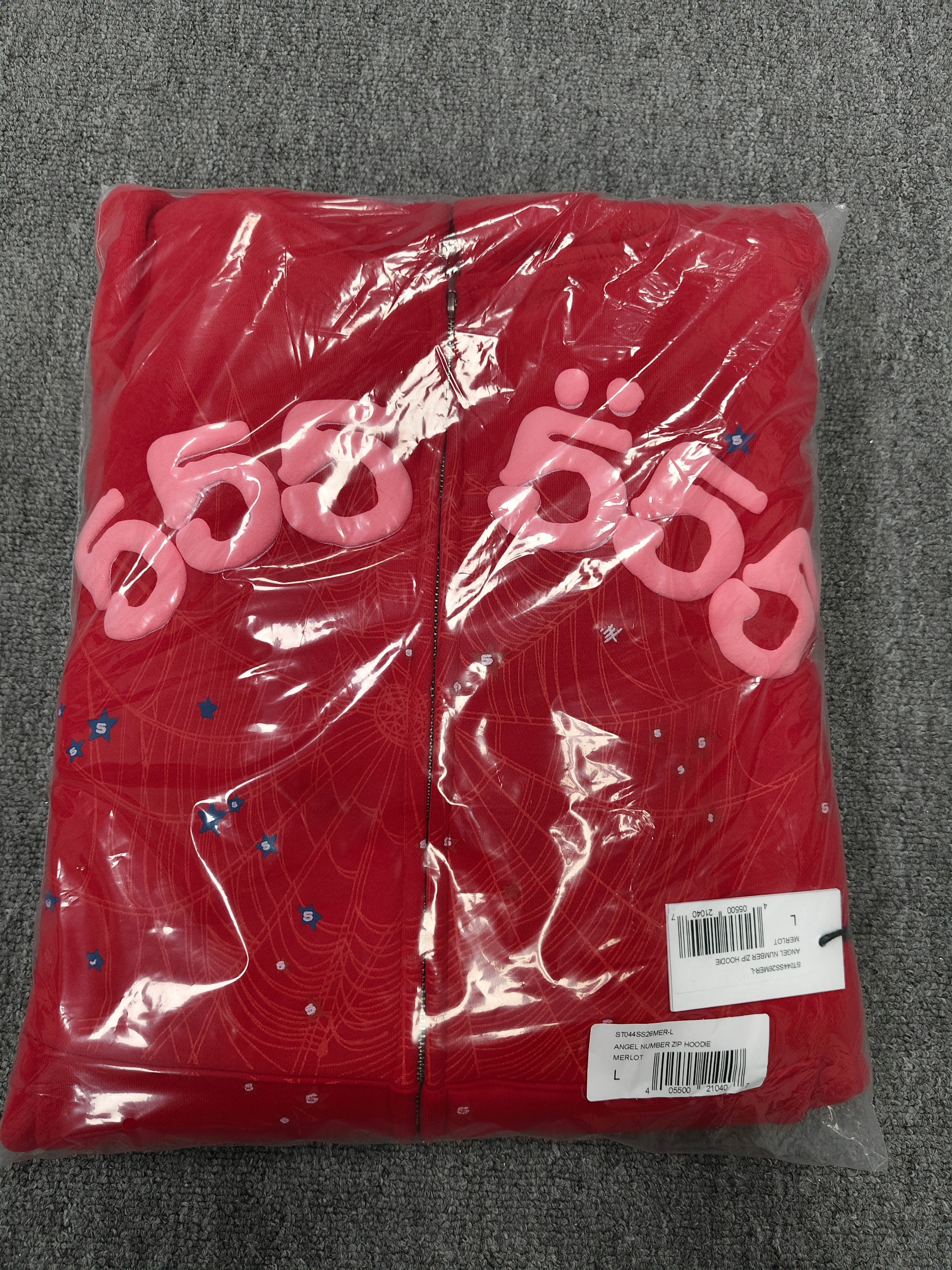 Sp5der Angel Number zip hoodie in red features a prominent sparkly spider web graphic on the chest
