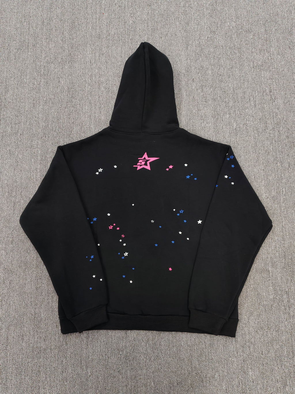 SP5DER CB Punk V2 Hoodie features a bold pink and white cobweb graphic on the chest