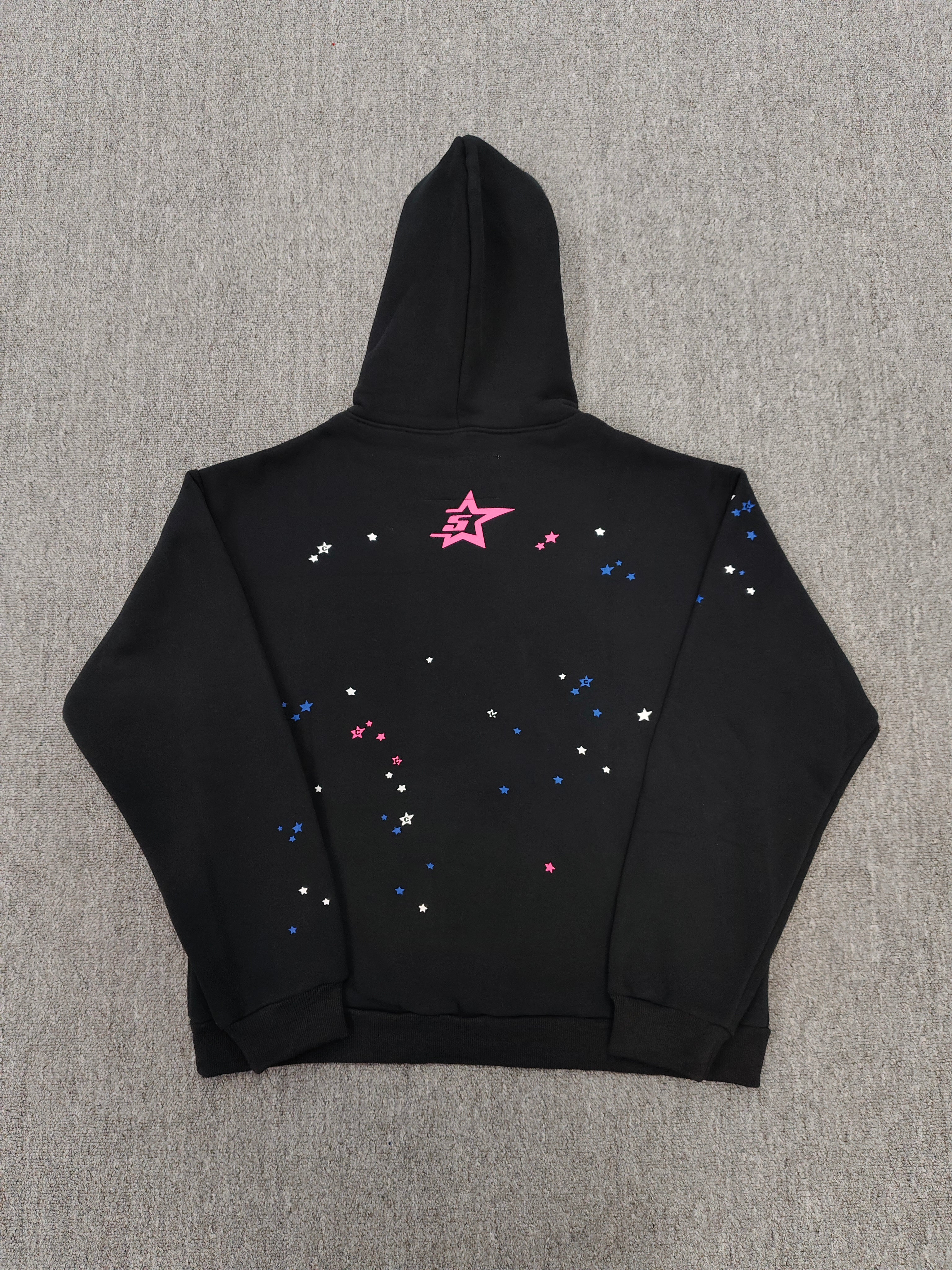 SP5DER CB Punk V2 Hoodie features a bold pink and white cobweb graphic on the chest