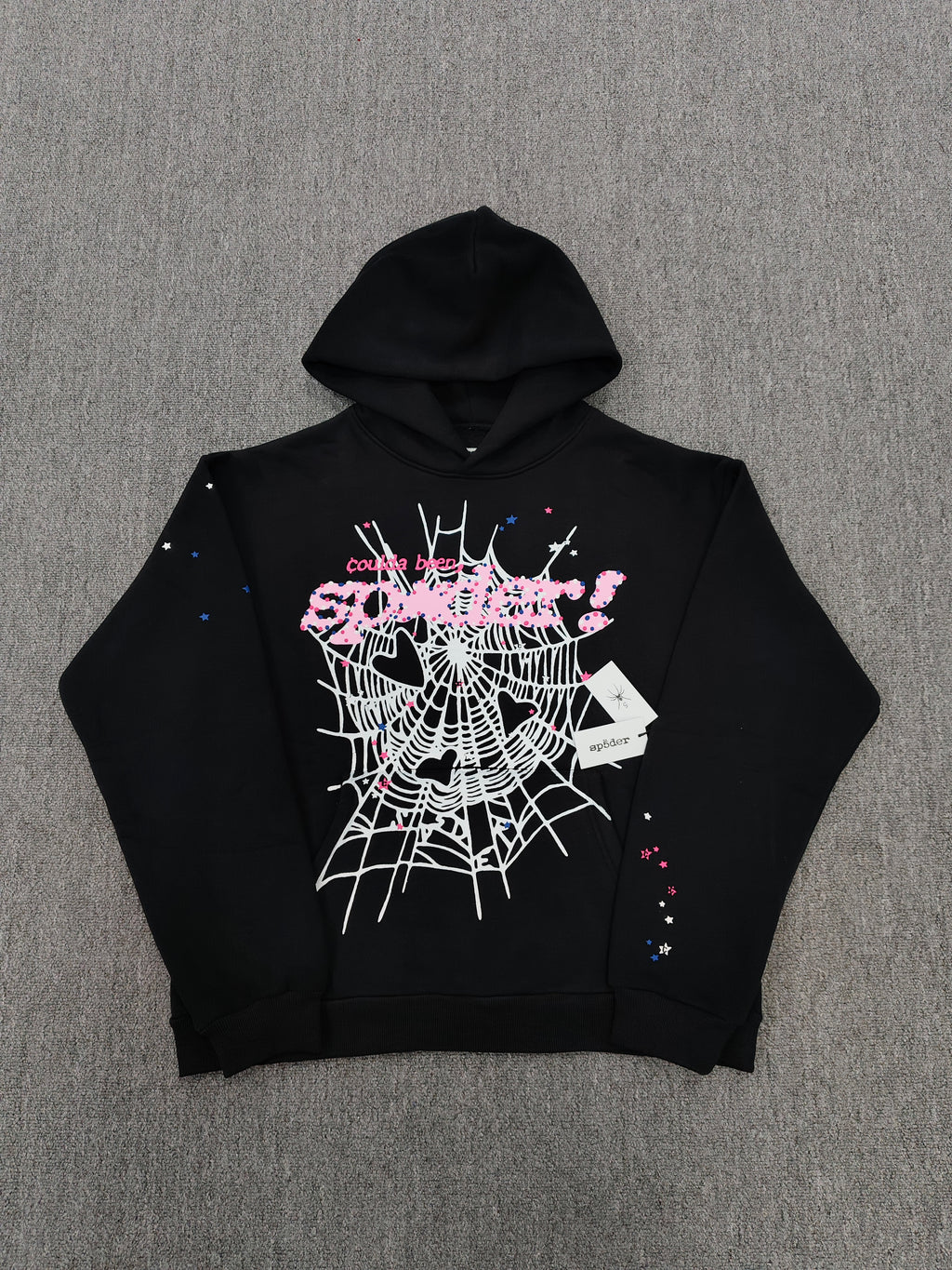 SP5DER CB Punk V2 Hoodie features a bold pink and white cobweb graphic on the chest