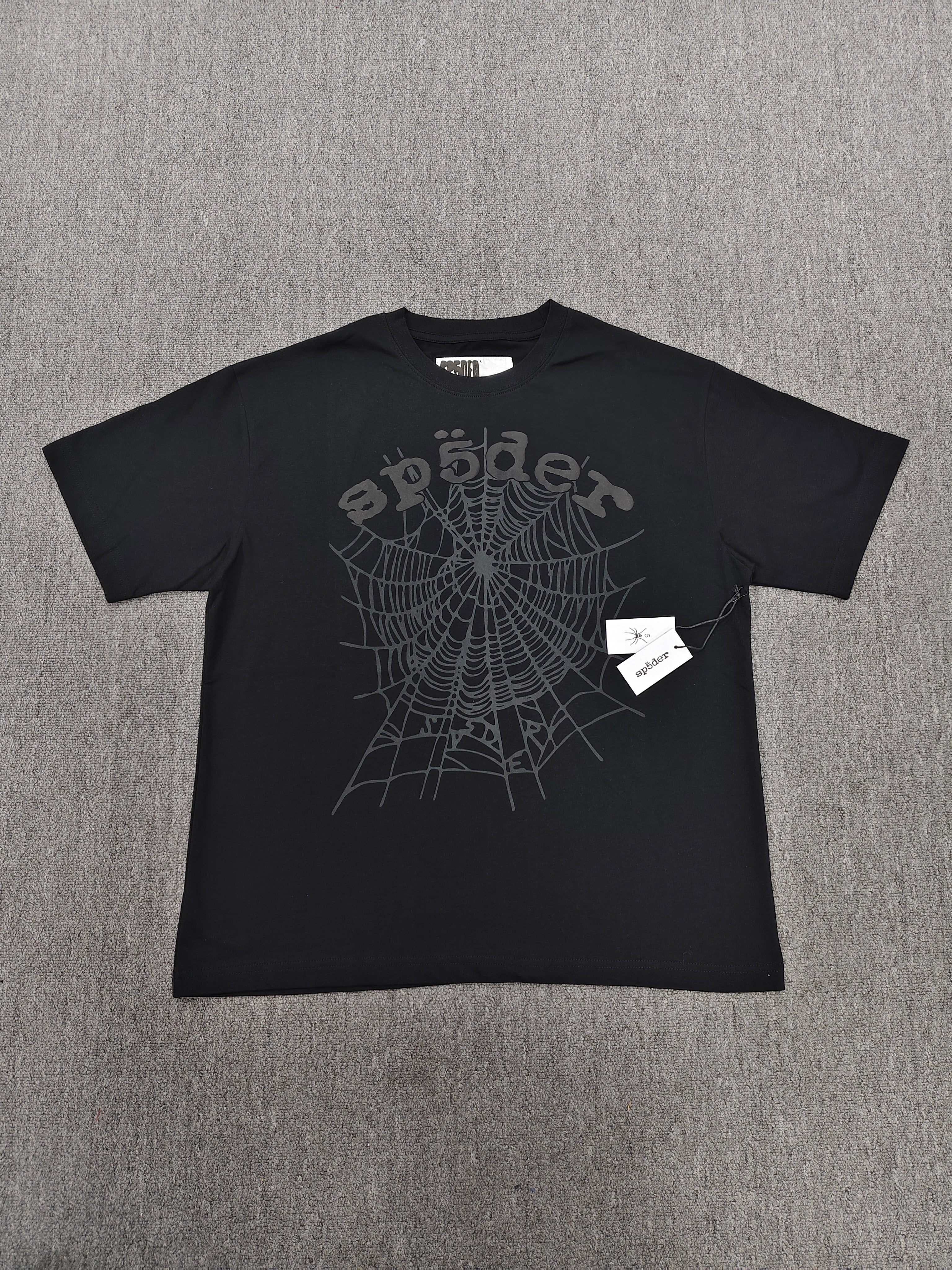 Sp5der Phantom OG Web Tee in black features a large gray spiderweb graphic on the chest