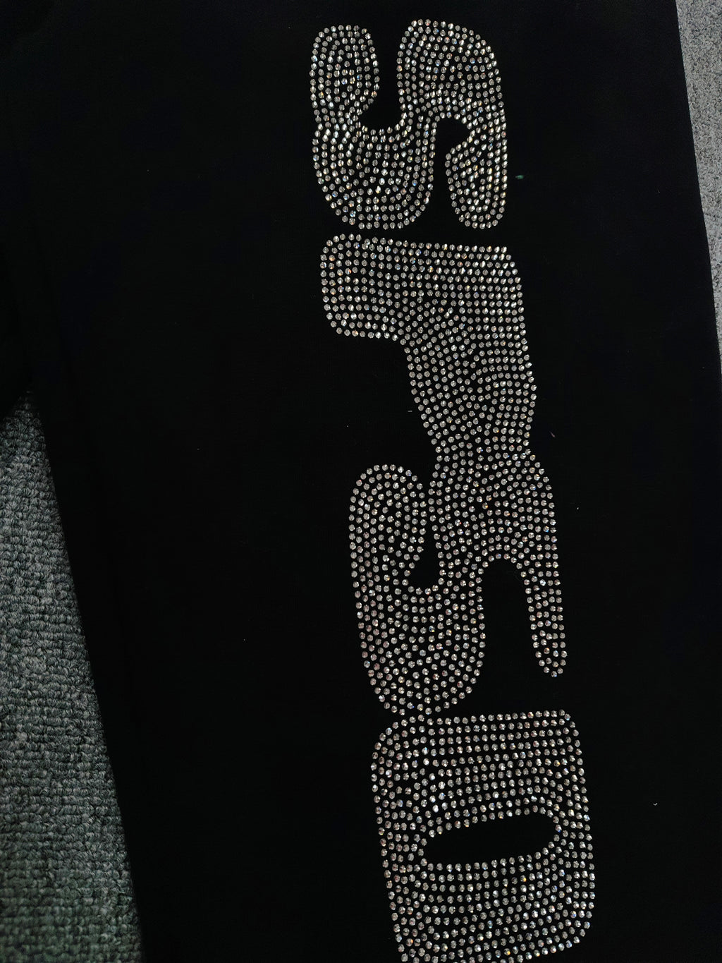 Sp5der Rhinestone Silk sweatpants in black featuring a large rhinestone-embellished logo and scattered star details