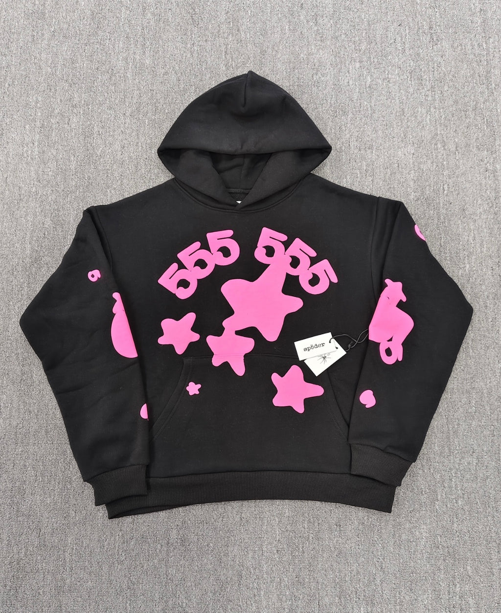 Sp5der Beluga Angel Number Hoodie in black featuring a prominent pink puff-print graphic on the chest