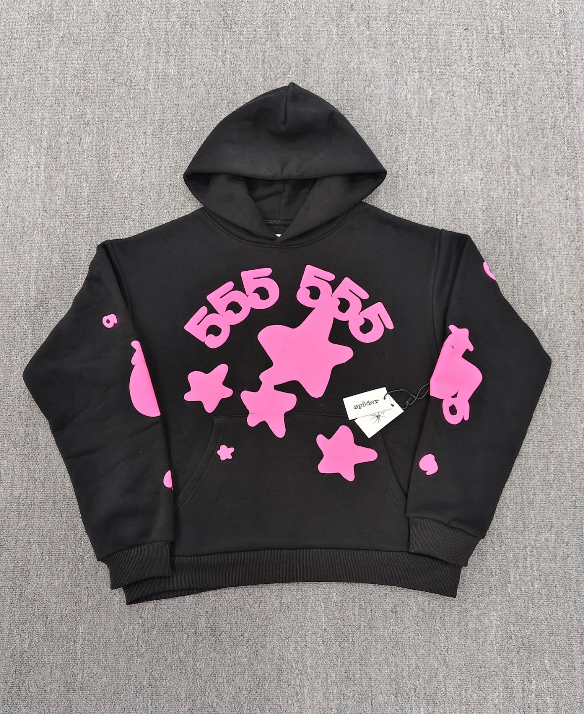 Sp5der Beluga Angel Number Hoodie in black featuring a prominent pink puff-print graphic on the chest