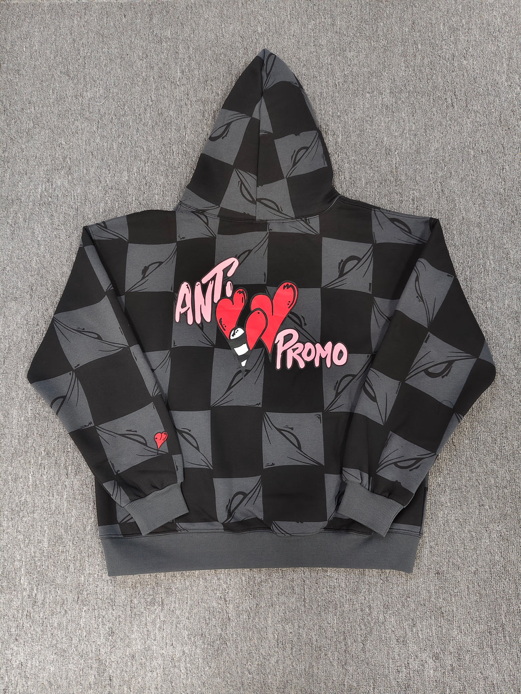 a Chrome Hearts Matty Boy "Anti Promo" 99 Eyes Hoodie featuring a checkered pattern.