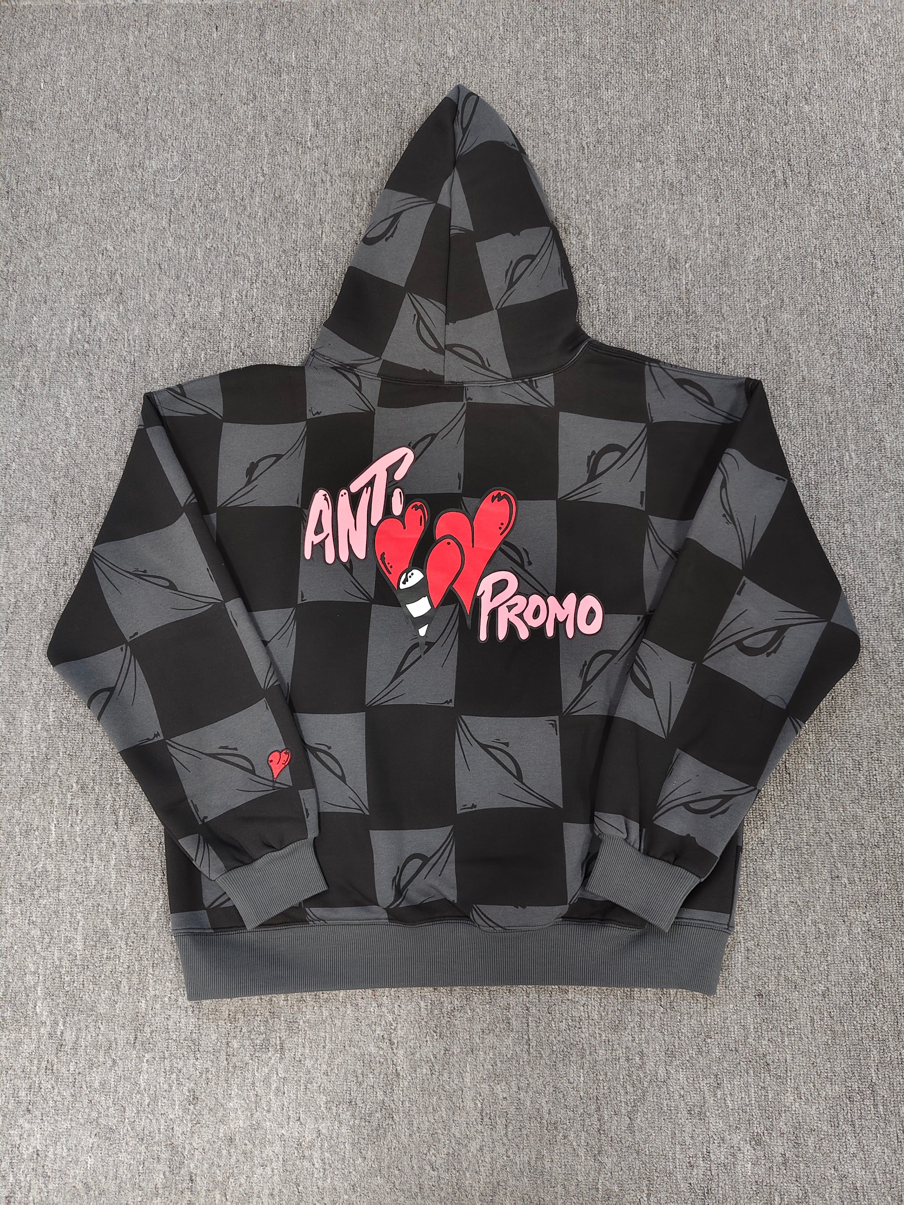 a Chrome Hearts Matty Boy "Anti Promo" 99 Eyes Hoodie featuring a checkered pattern.