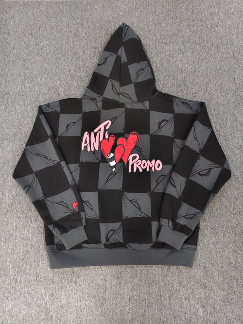 a Chrome Hearts Matty Boy "Anti Promo" 99 Eyes Hoodie featuring a checkered pattern.