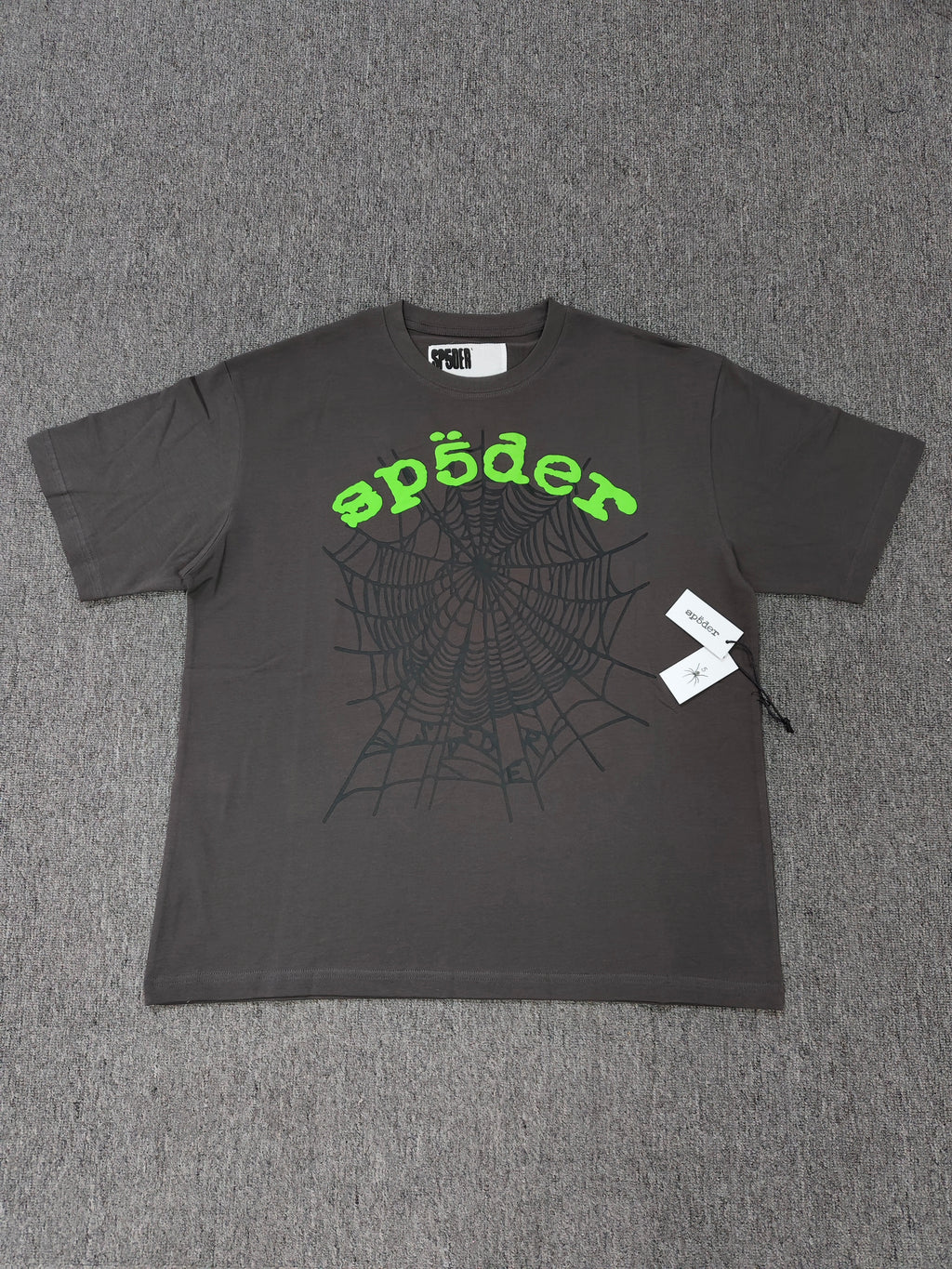 Sp5der shirts are featured in multiple colorways with prominent spiderweb branding