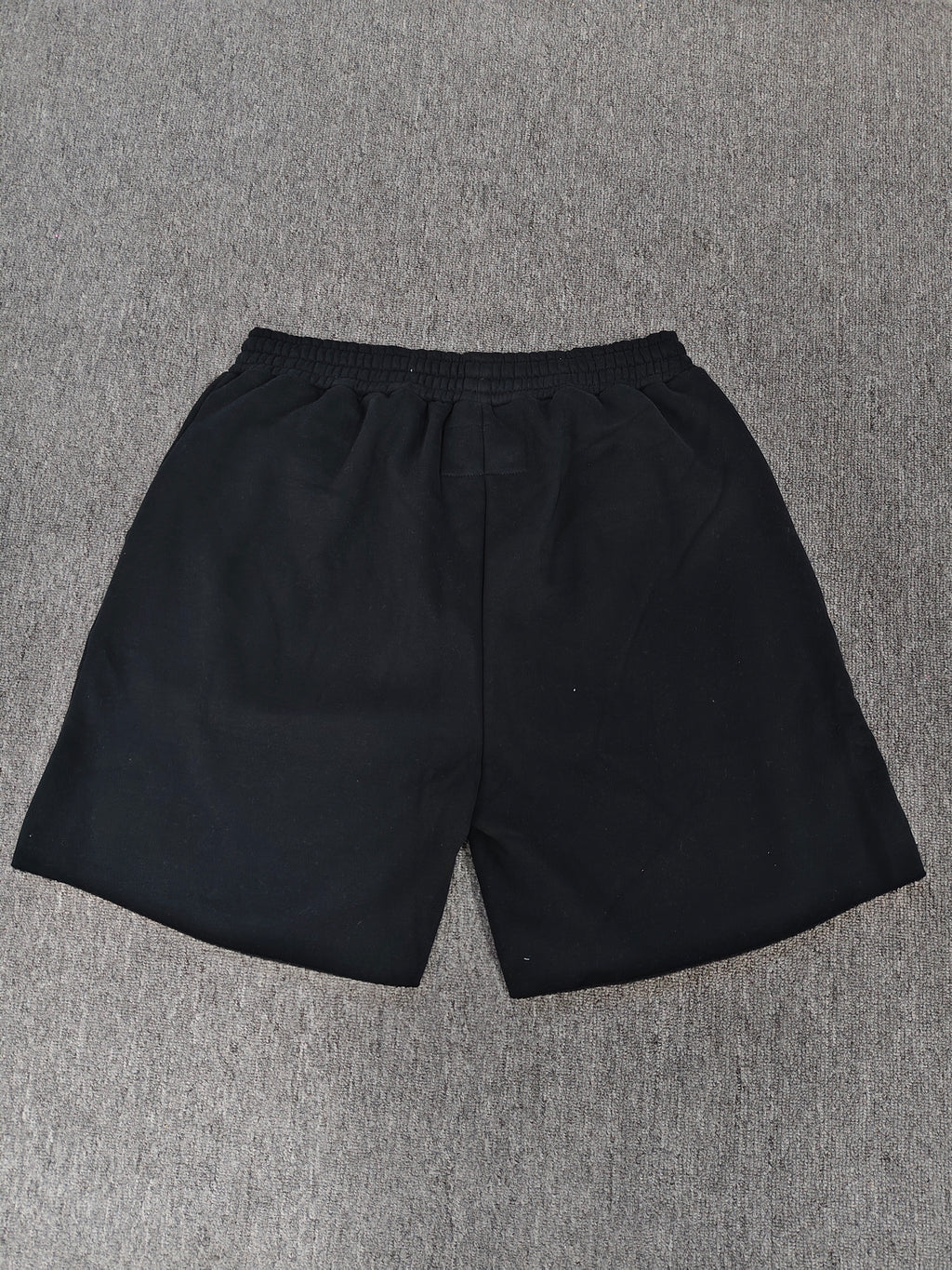 Sp5der OG Web V2 Phantom shorts in black feature a prominent rhinestone logo