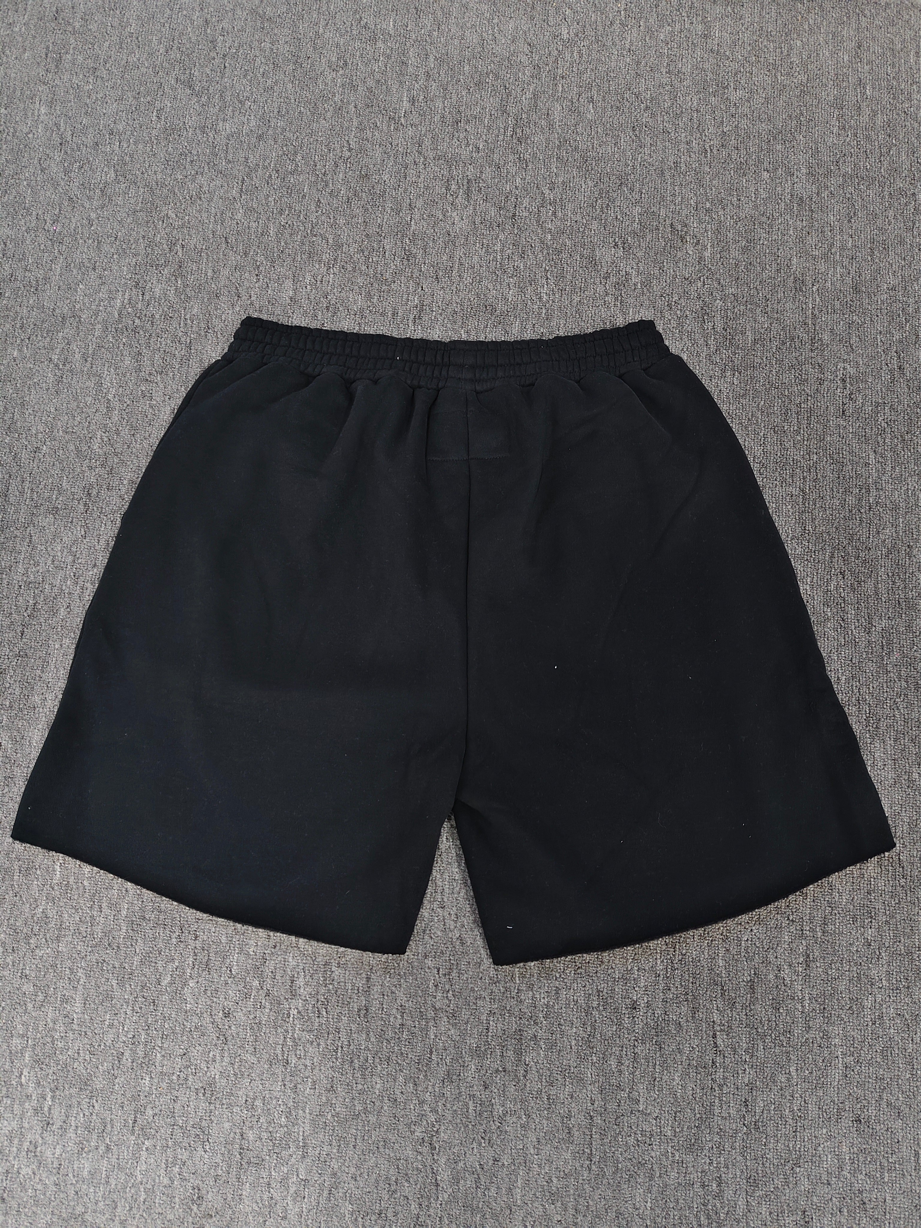 Sp5der OG Web V2 Phantom shorts in black feature a prominent rhinestone logo