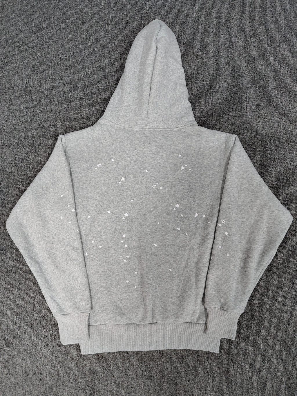 Sp5der Atlanta Full Zip Hoodie in Heather Grey, featuring a red "Atlanta" logo graphic with navy blue star accents