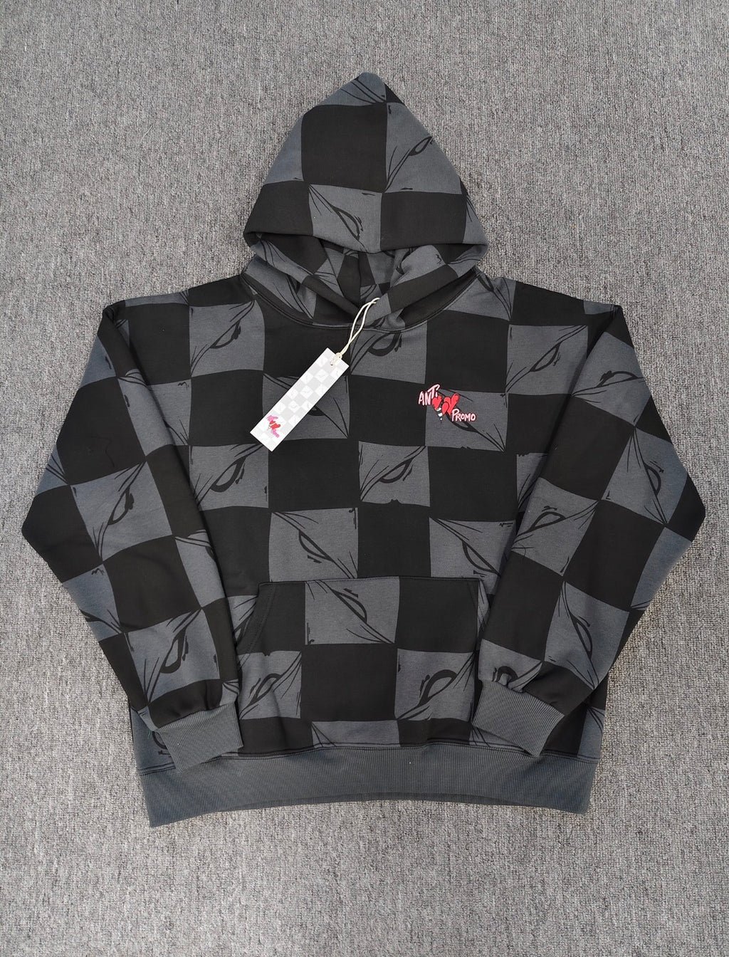 a Chrome Hearts Matty Boy "Anti Promo" 99 Eyes Hoodie featuring a checkered pattern.
