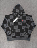 a Chrome Hearts Matty Boy "Anti Promo" 99 Eyes Hoodie featuring a checkered pattern.