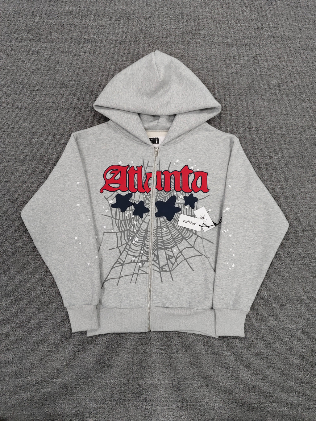 Sp5der Atlanta Full Zip Hoodie in Heather Grey, featuring a red "Atlanta" logo graphic with navy blue star accents