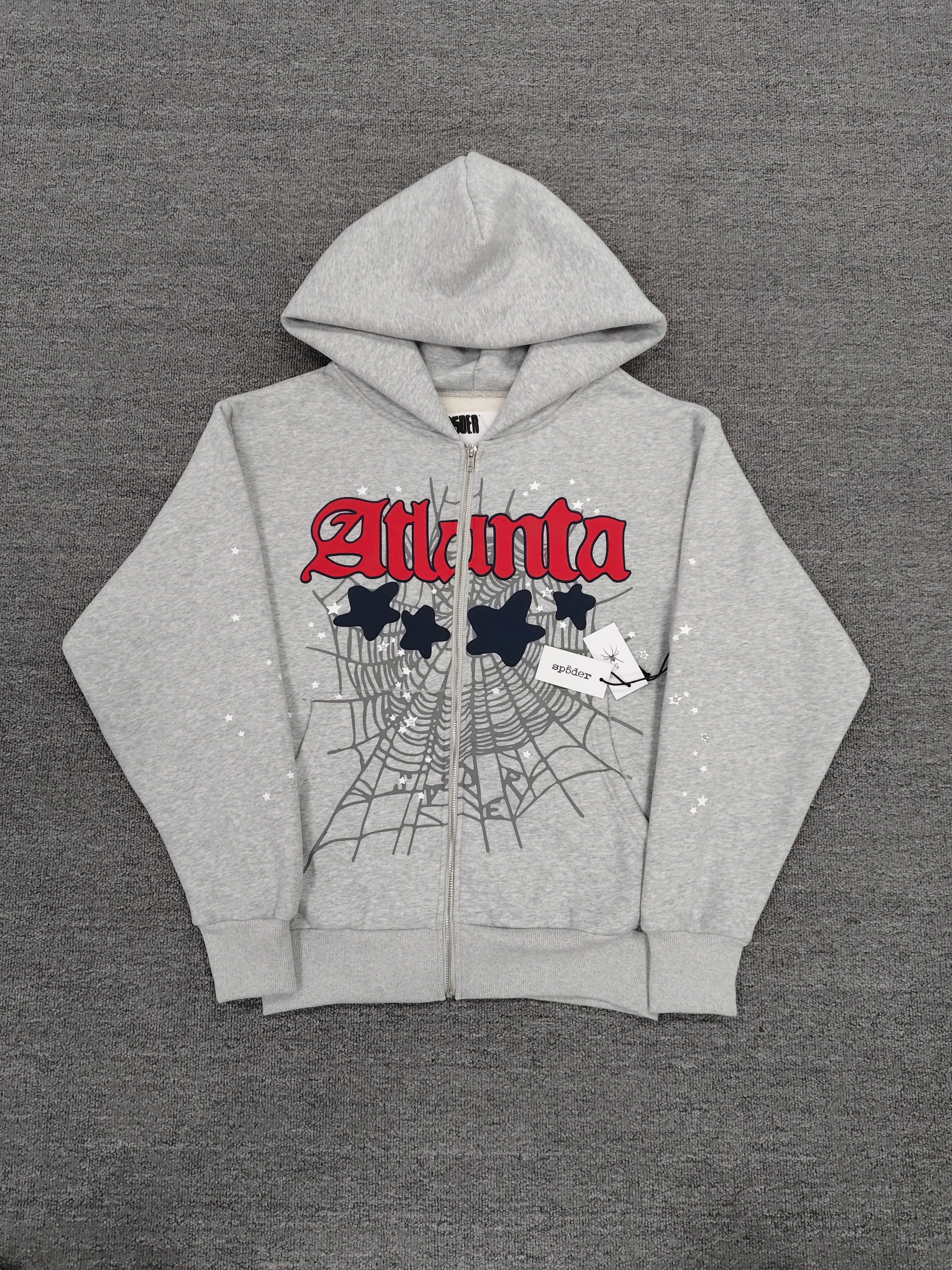 Sp5der Atlanta Full Zip Hoodie in Heather Grey, featuring a red "Atlanta" logo graphic with navy blue star accents