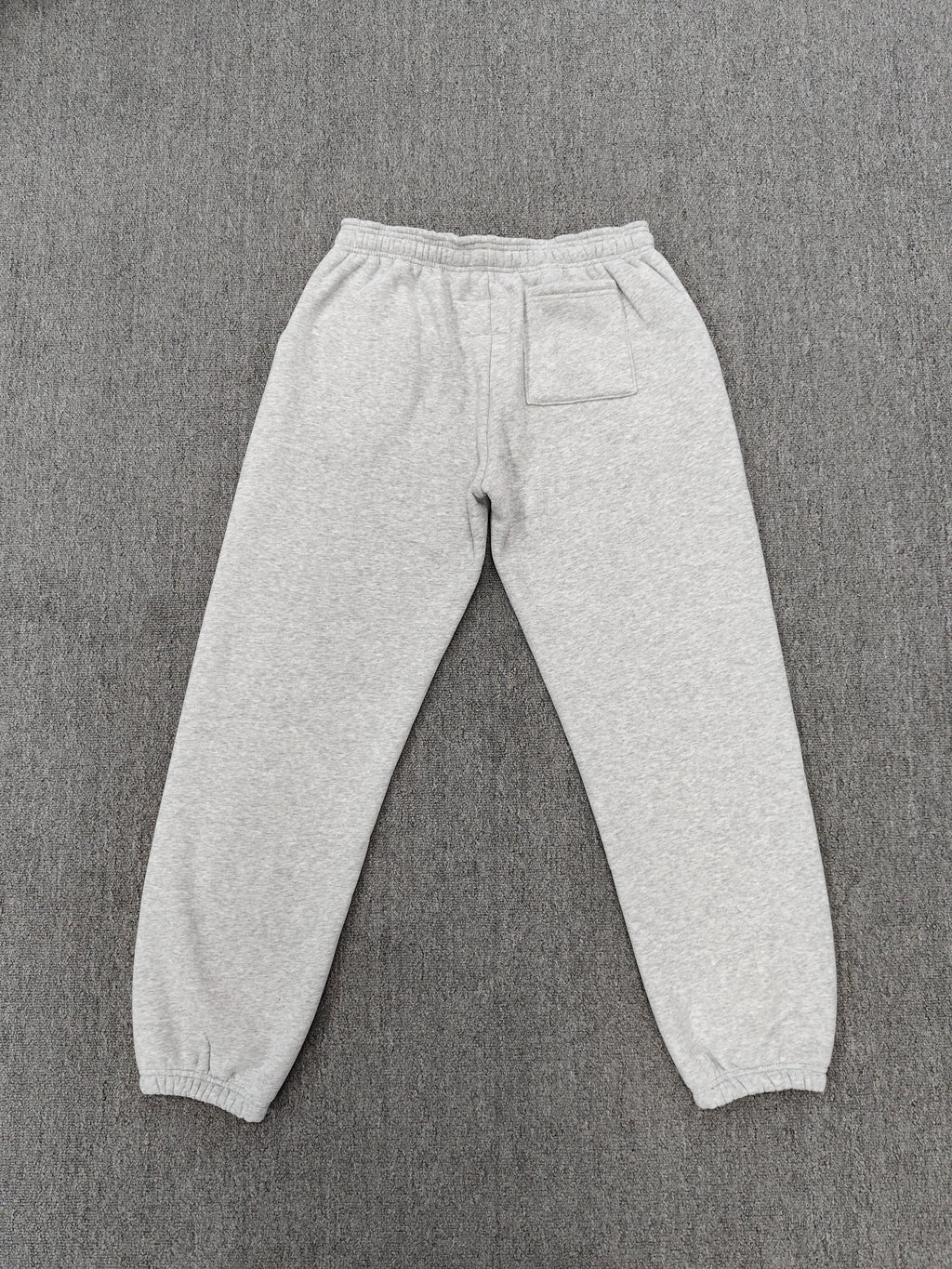 Sp5der Tonal Punk V2 sweatpants in Sport Grey feature scattered star prints and a large graphic logo down the leg