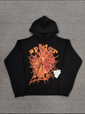 a Sp5der OG Web V2 Hoodie in a fire-like orange contrast on a black base.