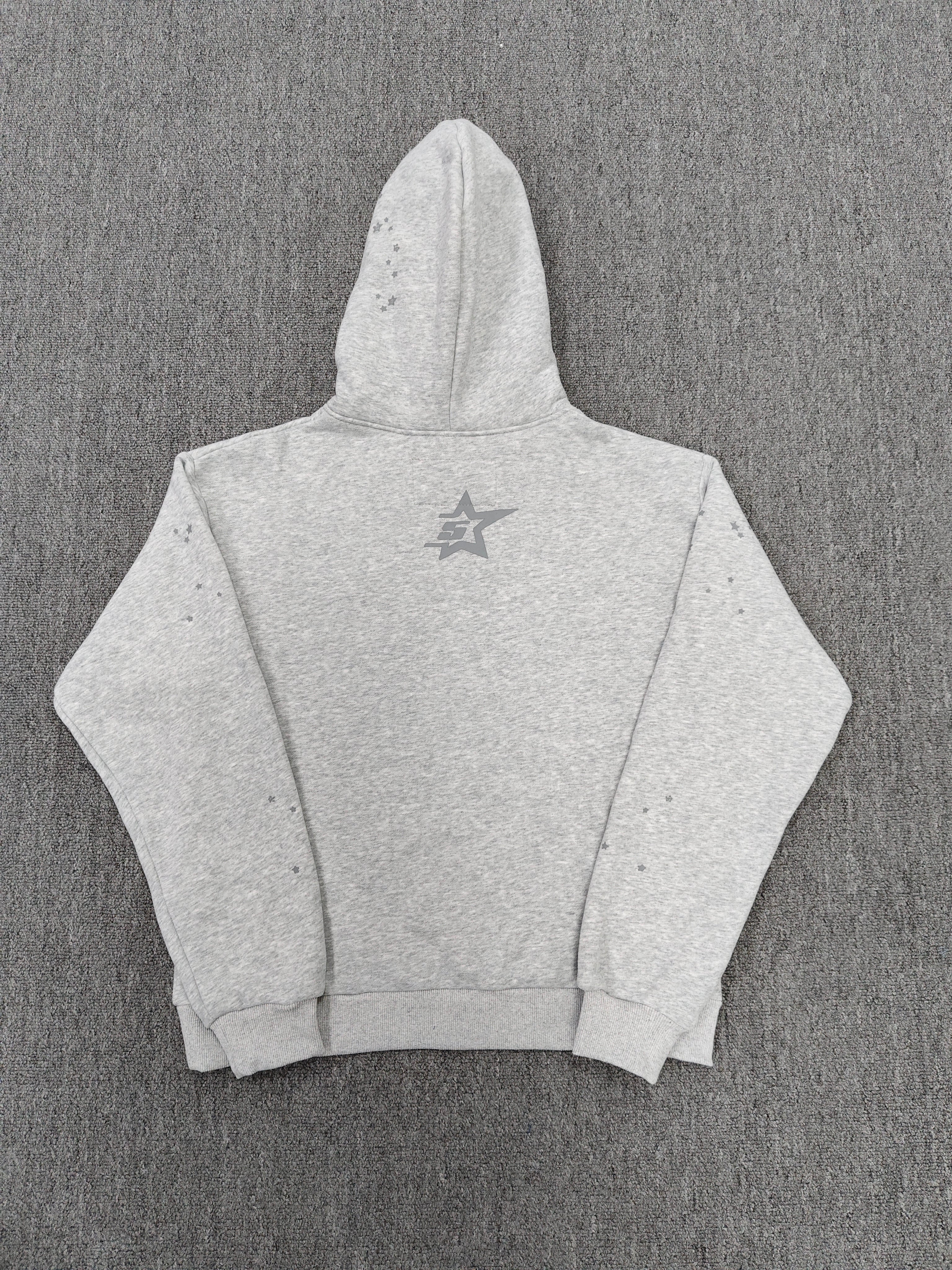a Sp5der Tonal Punk V2 Hoodie in Sport Grey, featuring a rhinestone-embellished logo and scattered star graphics