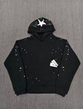 Sp5der Heavy Web Hoodie in black features a striking green and white star graphic print