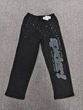 black SP5DER Rhinestone Punk V2 track pants feature rhinestone star embellishments and a rhinestone-encrusted logo