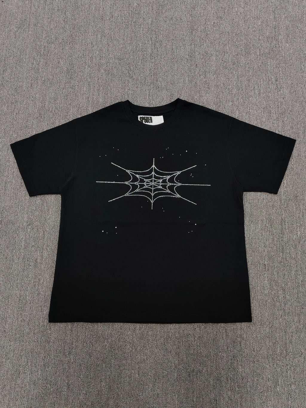 black Sp5der Rhinestone Silk Tee features a prominent crystal-embellished spider web graphic on the chest
