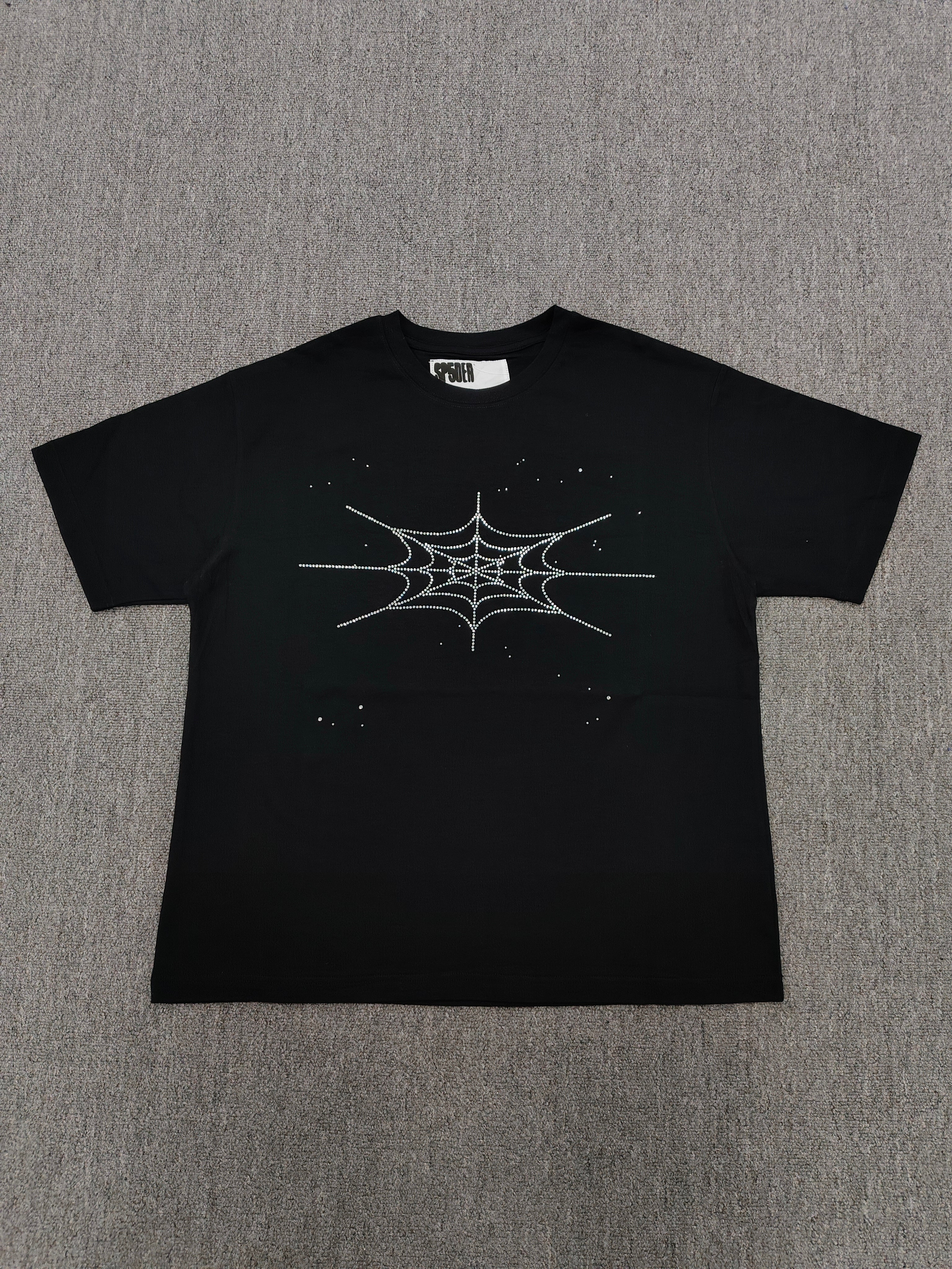 black Sp5der Rhinestone Silk Tee features a prominent crystal-embellished spider web graphic on the chest