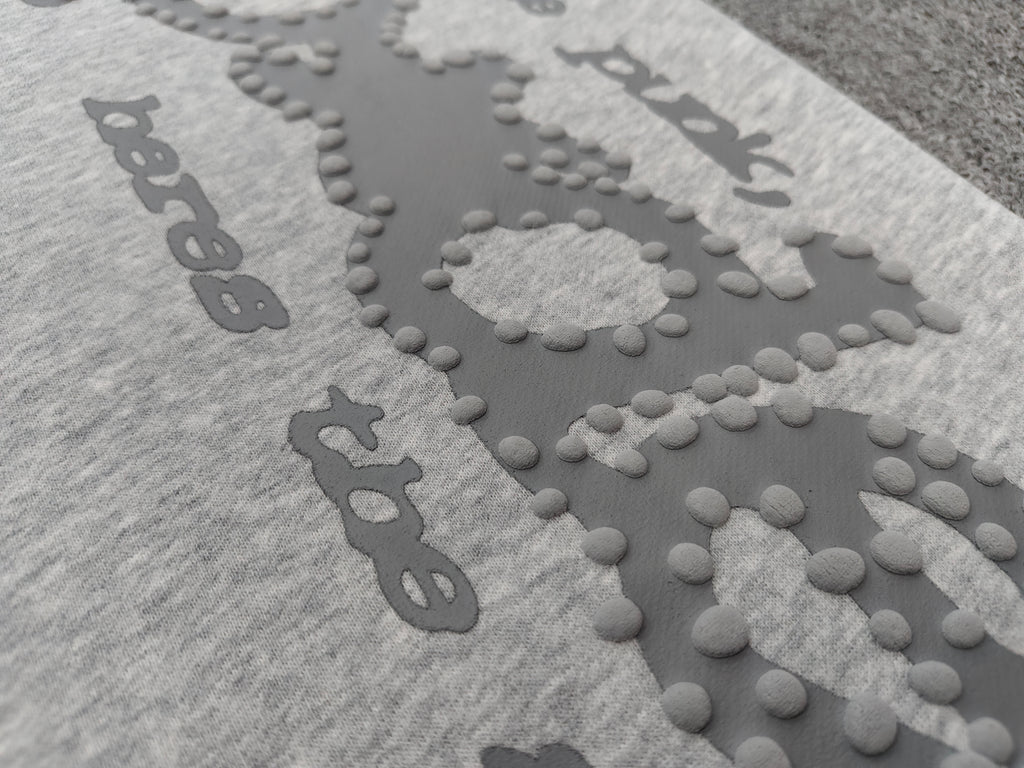 Sp5der Tonal Punk V2 sweatpants in Sport Grey feature scattered star prints and a large graphic logo down the leg