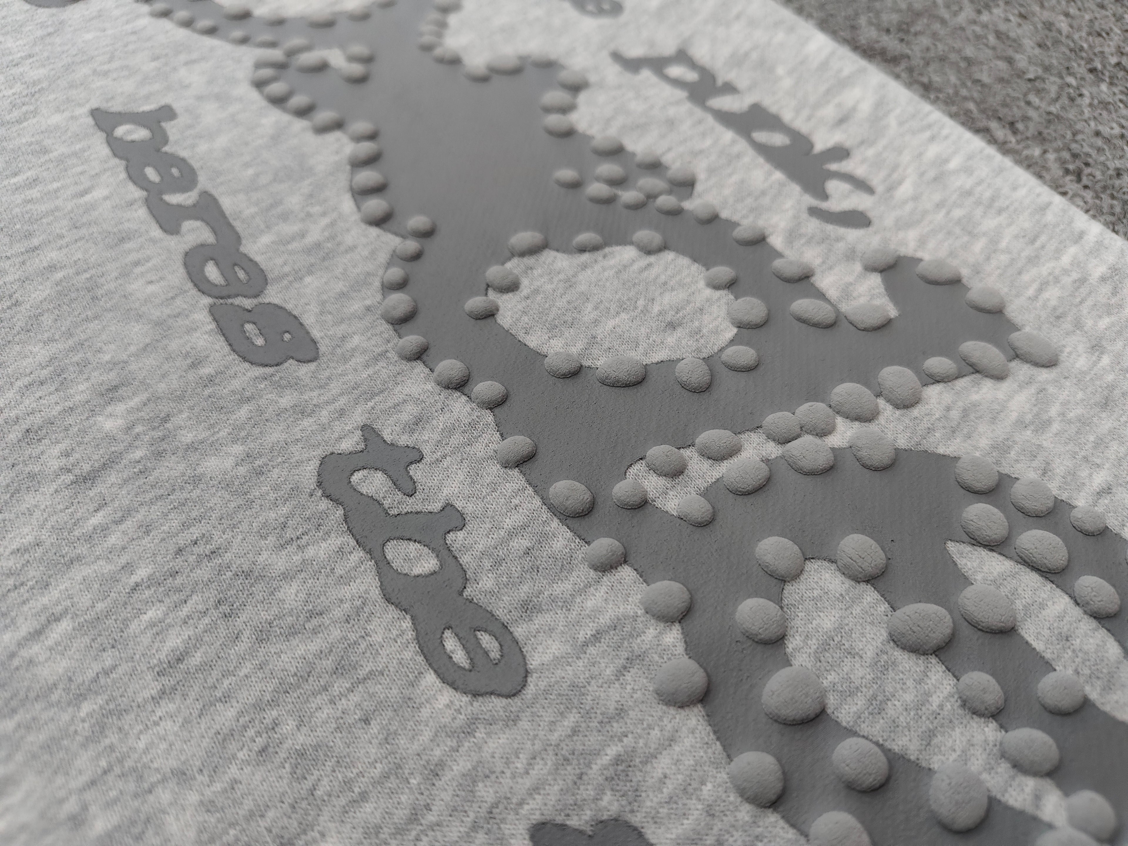 Sp5der Tonal Punk V2 sweatpants in Sport Grey feature scattered star prints and a large graphic logo down the leg