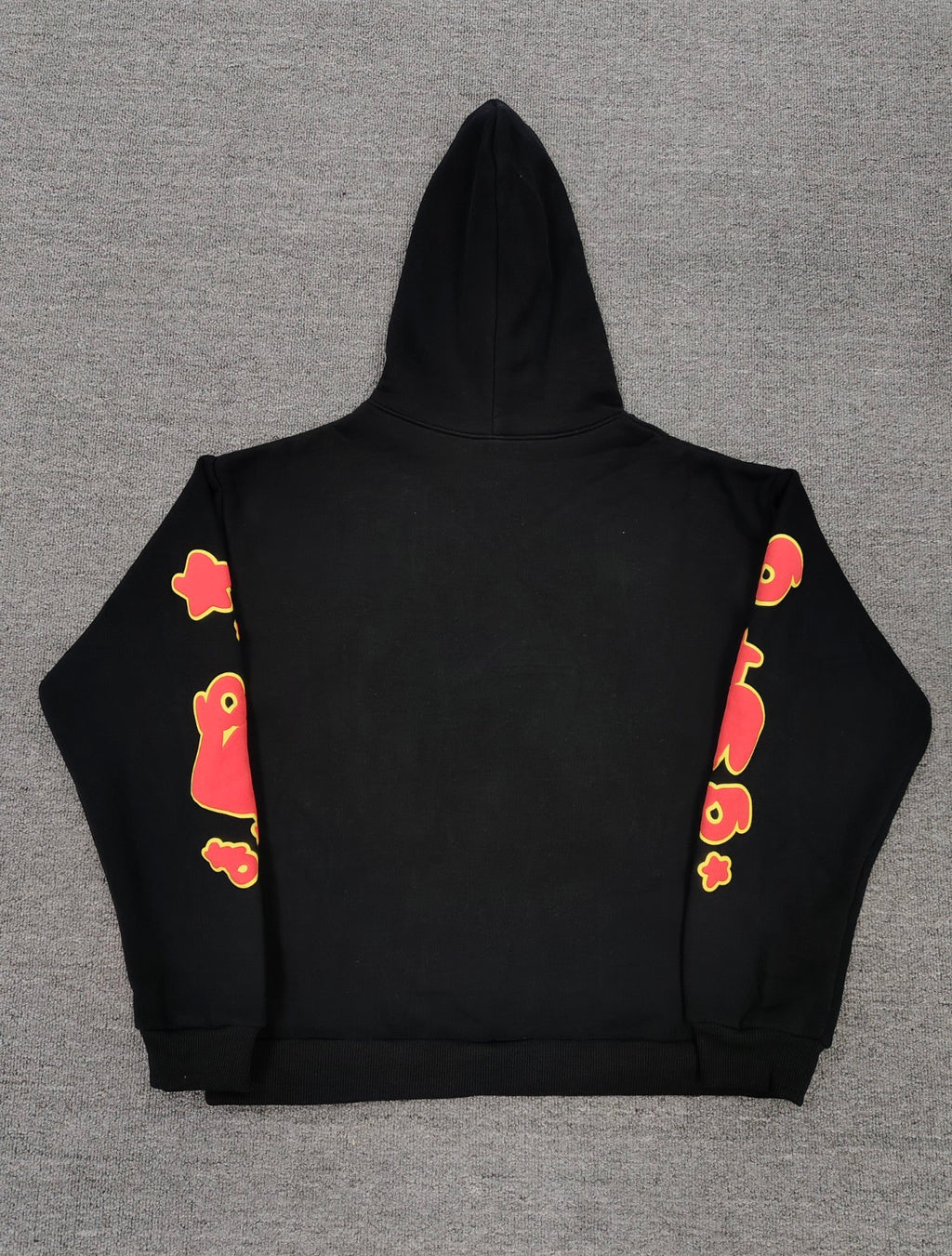 Sp5der x UY SCUTI Hoodie in black features prominent red star graphics