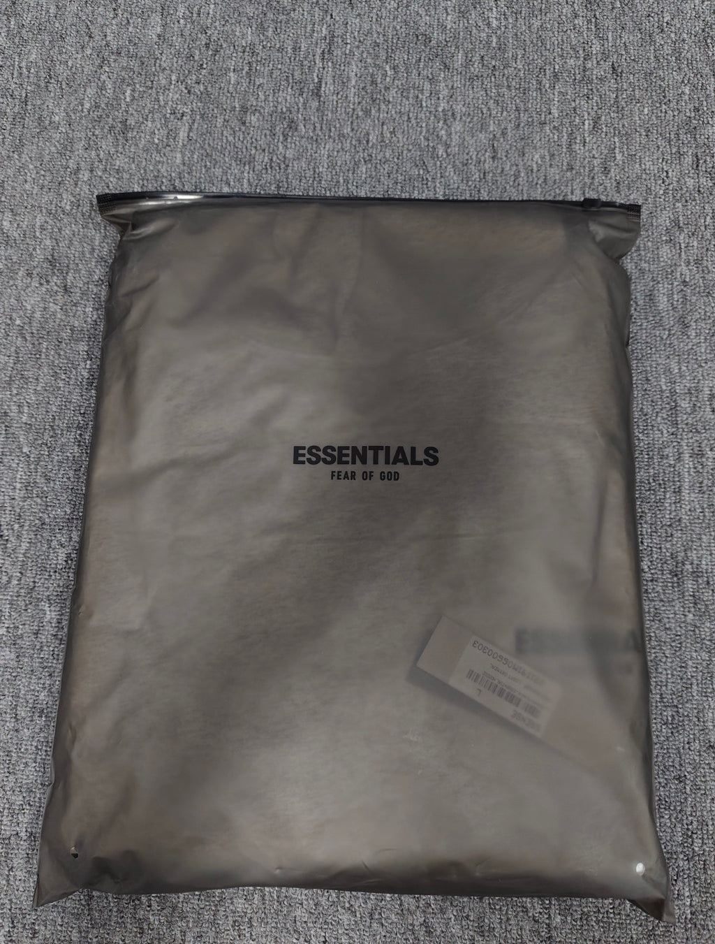 Fear of God Essentials hoodie in the Light Oatmeal